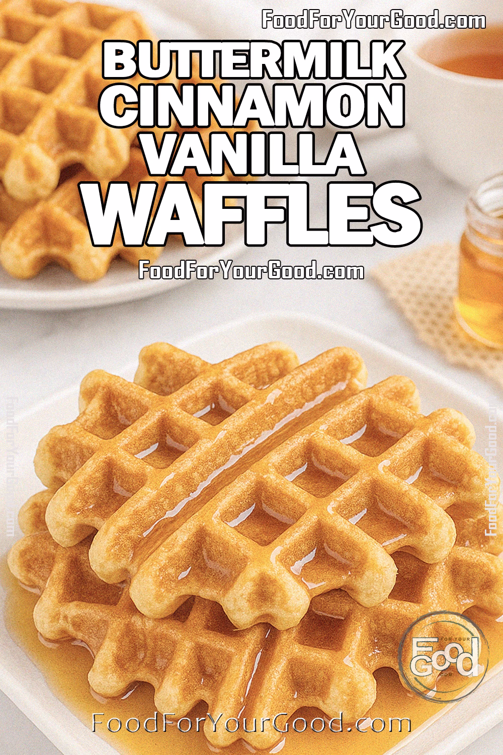 Buttermilk Cinnamon Vanilla Waffles Recipe | FoodForYourGood.com Stack of homemade buttermilk cinnamon vanilla waffles on a white square plate, drizzled with maple syrup, with tea and honey in the blurred marble background.