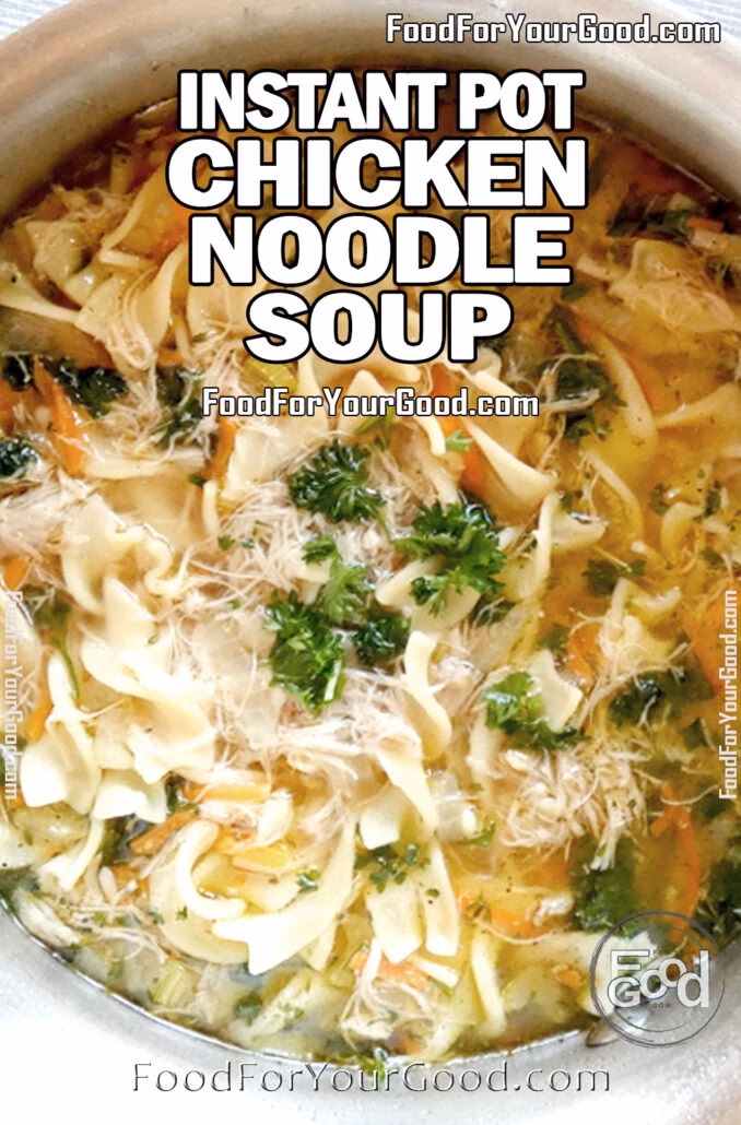 Instant Pot chicken noodle soup with shredded chicken, egg noodles, carrots, celery, and parsley in a flavorful broth inside a pot.