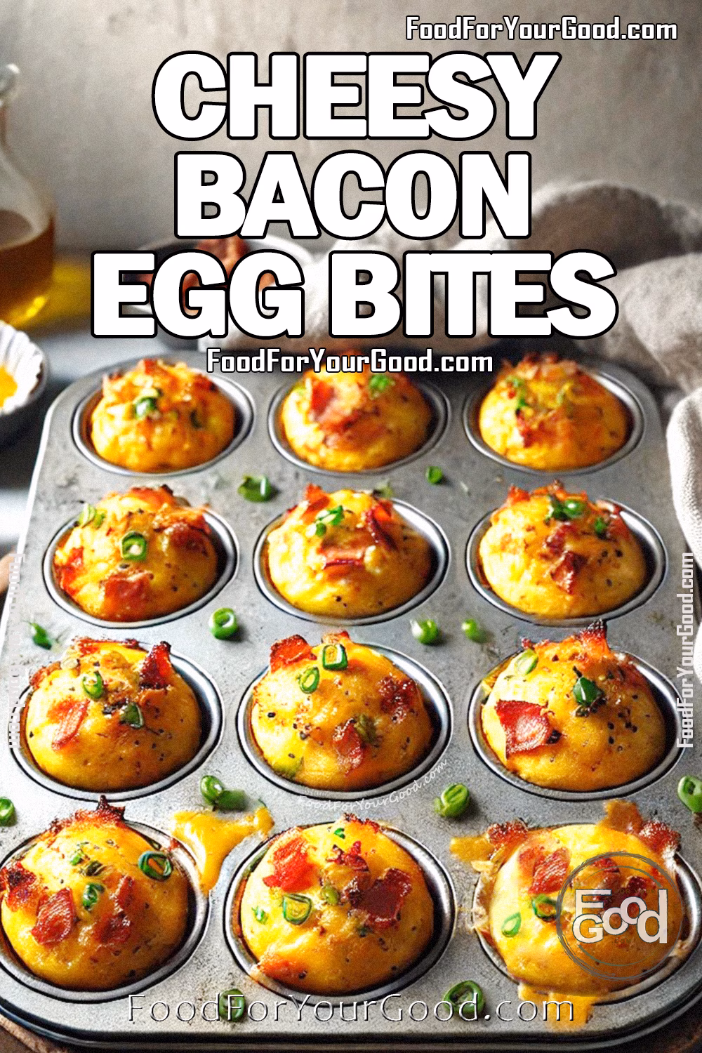 Cheesy Bacon Egg Bites Muffin Tin Recipe | FoodForYourGood.com Cheesy Bacon Egg Bites fresh out of the oven, served in a muffin tin, with crispy bacon, green onions, and a golden, cheesy texture on FoodForYourGood.com