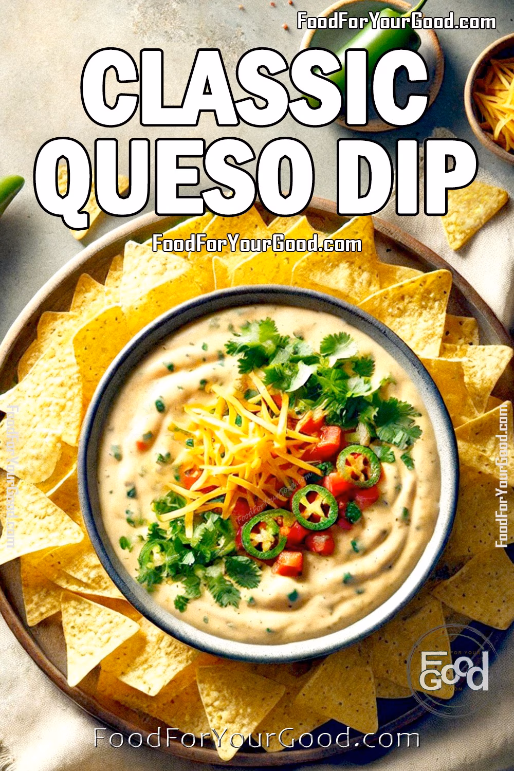 Classic Queso Dip Recipe – Creamy, Cheesy Dip with Jalapeños and Cilantro | FoodForYourGood.com Classic Queso Dip garnished with shredded cheddar, cilantro, jalapeño slices, and diced tomatoes, served with tortilla chips on FoodForYourGood.com