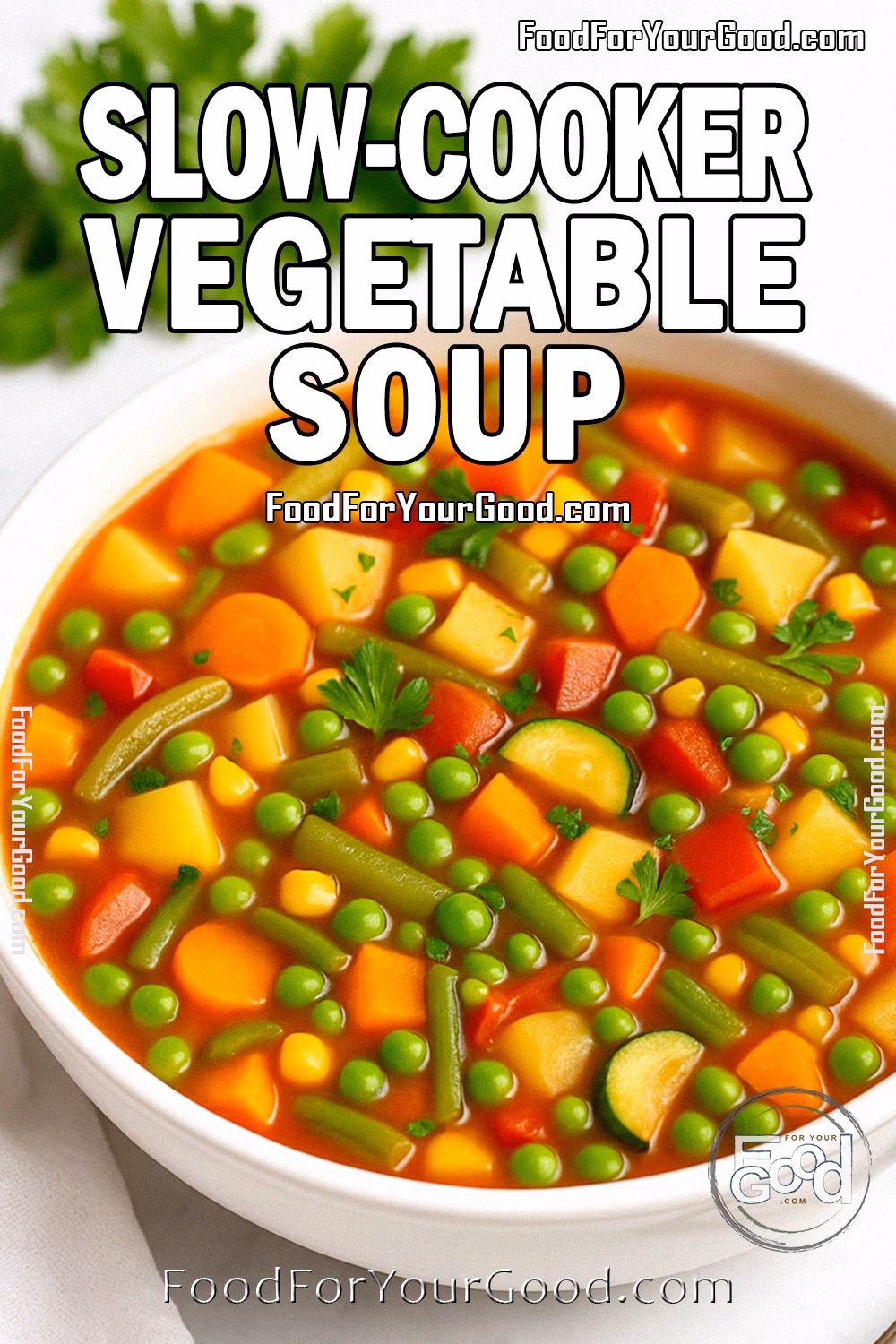 Slow-Cooker Vegetable Soup featuring vibrant, finely chopped vegetables in a rich, savory broth, garnished with fresh parsley. A cozy and hearty recipe from FoodForYourGood.com