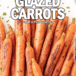 Overhead view of roasted glazed carrots with parsley on a white marble board, served as a side dish.