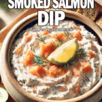 A creamy, homemade Best Ever Smoked Salmon Dip garnished with fresh dill and a lemon wedge, served in a rustic ceramic bowl on a luxurious wooden board with toasted bread and crackers. Perfect for parties, appetizers, and seafood lovers.