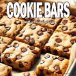 Delicious homemade chocolate chip cookie bars freshly baked and cut into squares, featuring gooey chocolate chips and a golden-brown texture. A perfect dessert recipe from FoodForYourGood.com