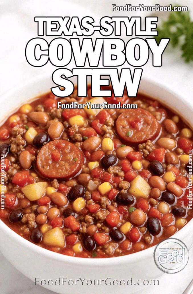 A rich anHomemade Texas-Style Cowboy Stew served in a heavy white bowl on a marble countertop with sausage slices, ground beef, beans, potatoes, corn, and fire-roasted tomatoes, garnished with herbs and a spoon on the side | FoodForYourGood.com