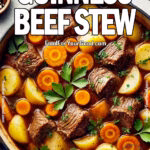 Guinness Beef Stew in a Dutch oven, filled with tender beef, sliced carrots, and golden potatoes in a rich, hearty Guinness-infused broth. A warm, comforting dish perfect for cozy nights.