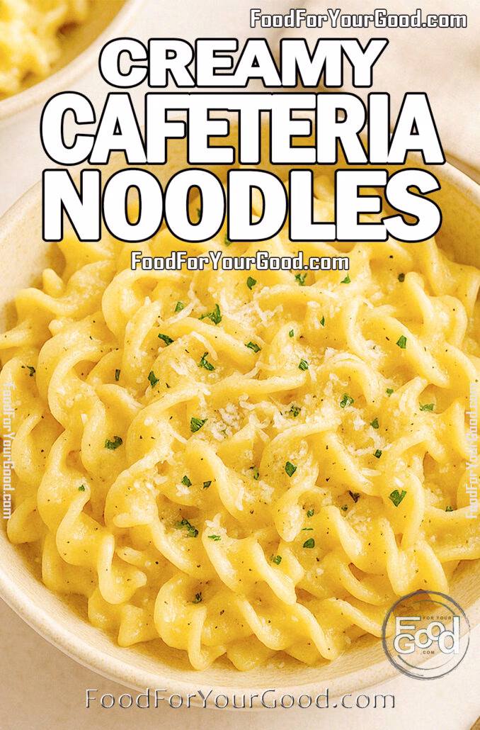 Creamy Cafeteria Noodles A bowl of creamy cafeteria-style egg noodles topped with Parmesan cheese and parsley, served in a beige ceramic bowl on a marble surface.