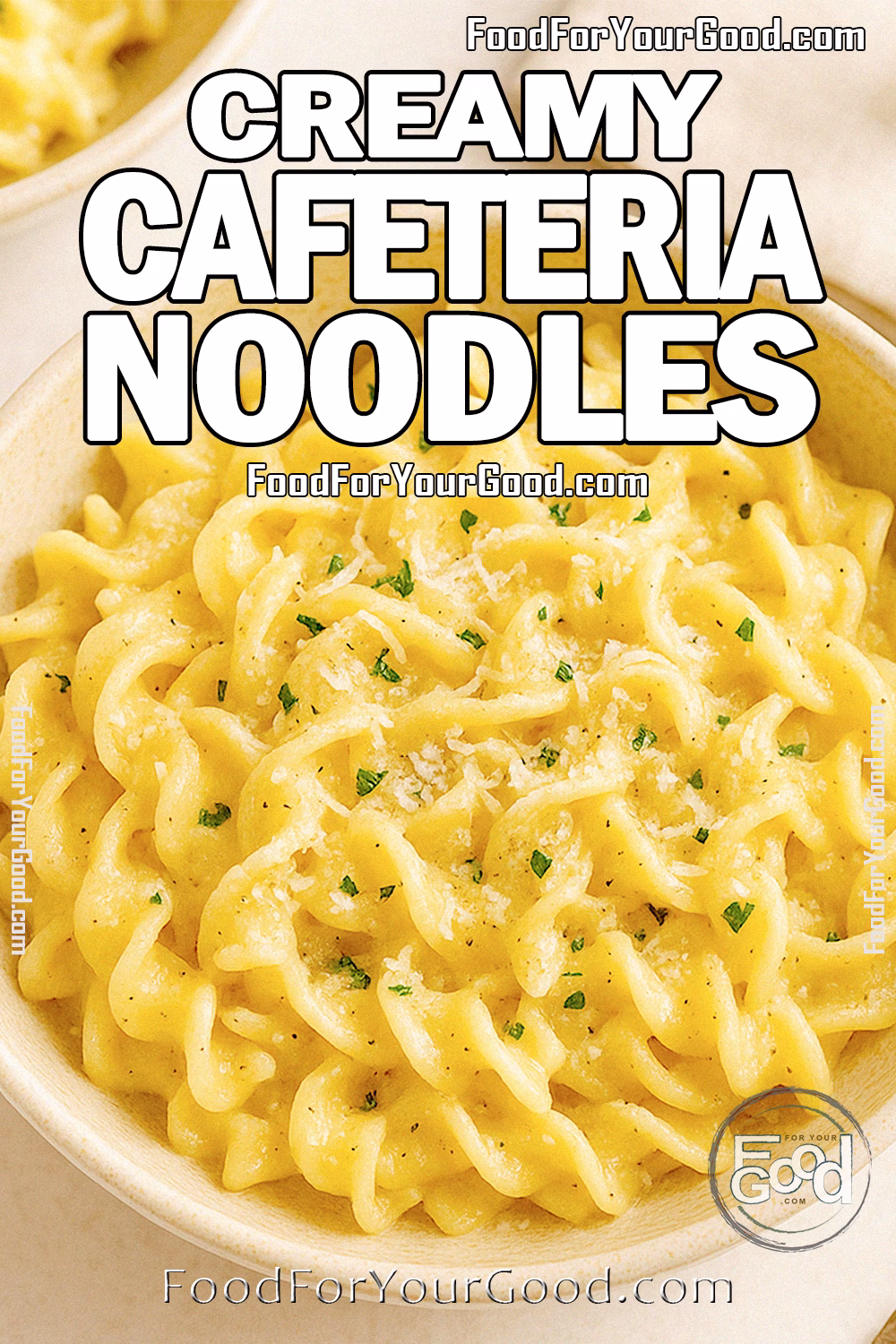 Creamy Cafeteria Noodles in a Bowl with Parmesan Cheese – FoodForYourGood.com A bowl of creamy cafeteria-style egg noodles topped with Parmesan cheese and parsley, served in a beige ceramic bowl on a marble surface.