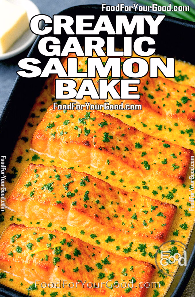 Creamy Garlic Salmon Bake Creamy Garlic Butter Baked Salmon in black dish topped with fresh parsley on marble background