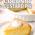 A slice of Crustless Coconut Custard Pie on a white plate with whipped cream, in front of the full pie with powdered sugar.