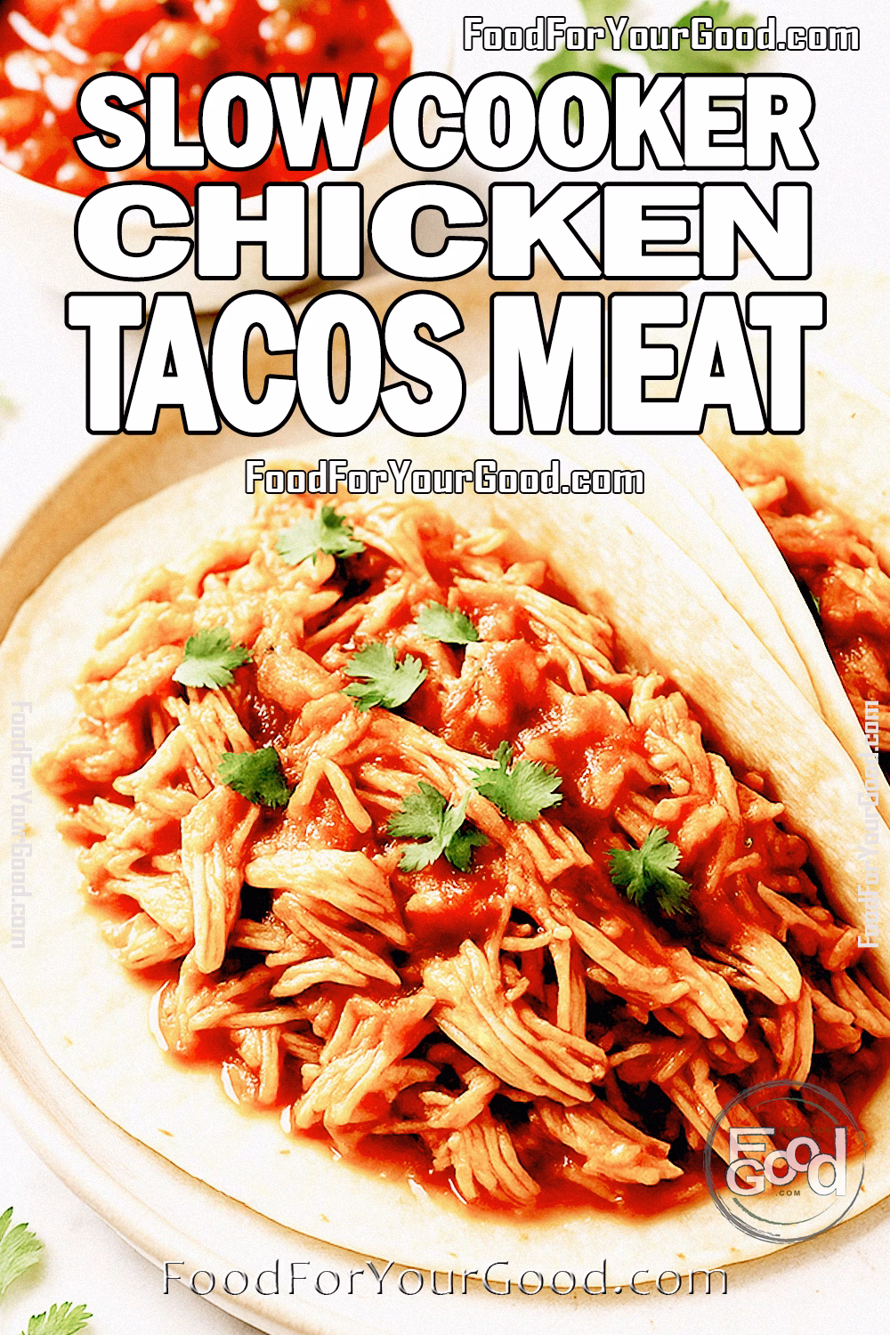 Slow Cooker Chicken Tacos Meat Recipe | FoodForYourGood.com Slow Cooker Chicken Tacos Meat served on tortillas with salsa and taco seasoning on a marble background