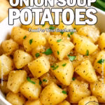 A bowl of Slow Cooker Onion Soup Potatoes seasoned with onion soup mix and garnished with parsley and chives.
