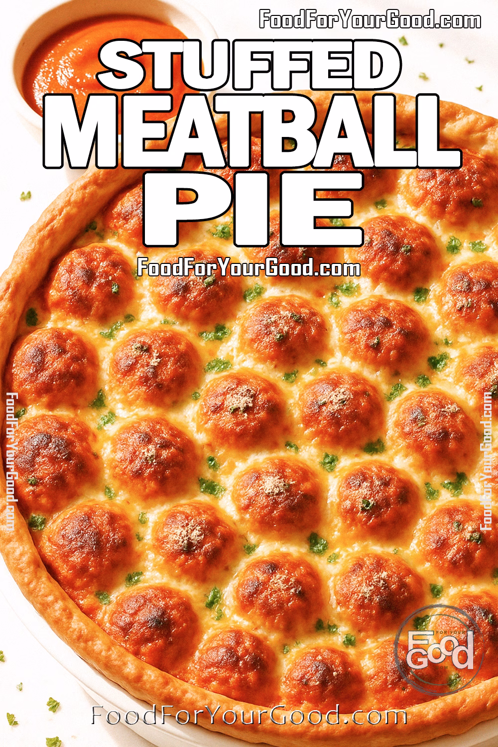 Stuffed Meatball Pie – FoodForYourGood.com Freshly baked Stuffed Meatball Pie in a golden crust, filled with mozzarella-topped meatballs and garnished with parsley, served with marinara sauce.