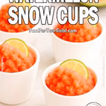 Four watermelon snow cups in white ceramic cups with lime wedges and mint leaves laid on top