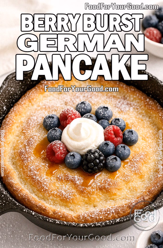Berry Burst German Pancake with whipped cream and berries in a cast iron skillet