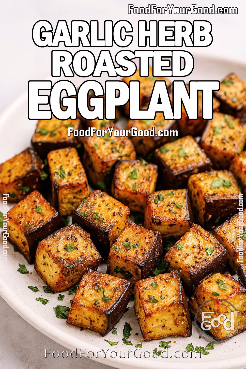 Garlic Herb Roasted Eggplant served on a white ceramic plate, garnished with parsley.