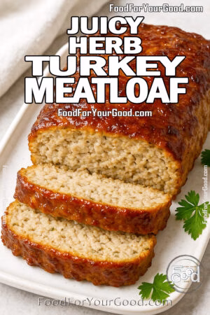 Homemade Juicy Herb Turkey Meatloaf with maple-Dijon glaze on white ceramic plate