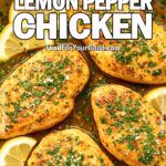 Golden lemon pepper chicken breasts in stainless steel skillet with parsley and Parmesan garnish