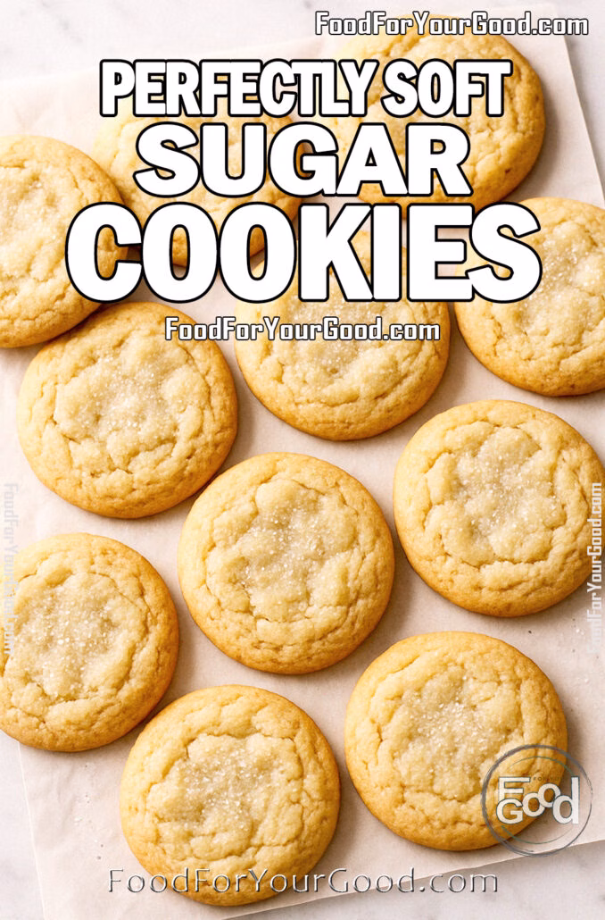 Perfectly Soft Sugar Cookies Perfectly Soft Sugar Cookies arranged on parchment paper over a marble surface