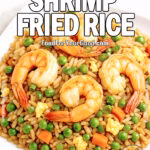 Better-Than-Takeout Shrimp Fried Rice with vegetables on white plate