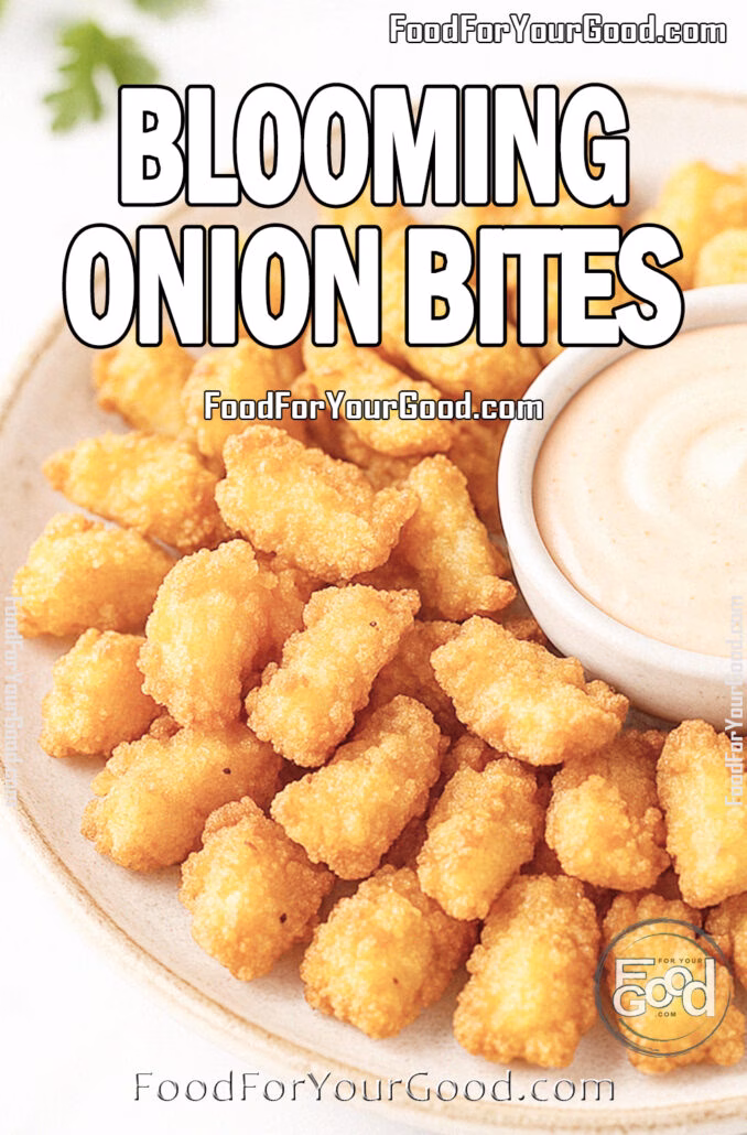 Blooming Onion Bites Blooming Onion Bites arranged around a creamy dipping sauce on a white marble countertop, styled with fresh herbs and a white towel.