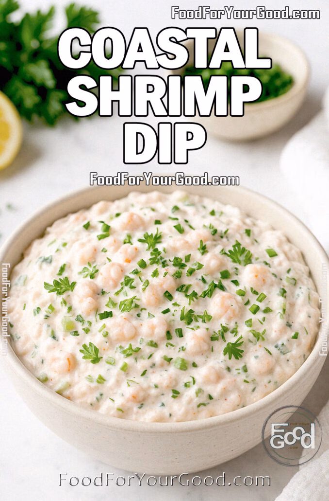 Coastal Shrimp Dip A creamy bowl of Coastal Shrimp Dip garnished with fresh parsley and chives, served on a white marble background.