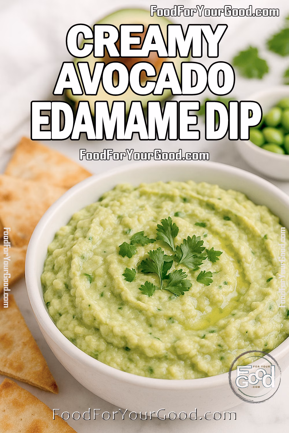 Homemade-style avocado edamame dip in a white bowl with rustic texture, topped with cilantro, on marble with pita chips.