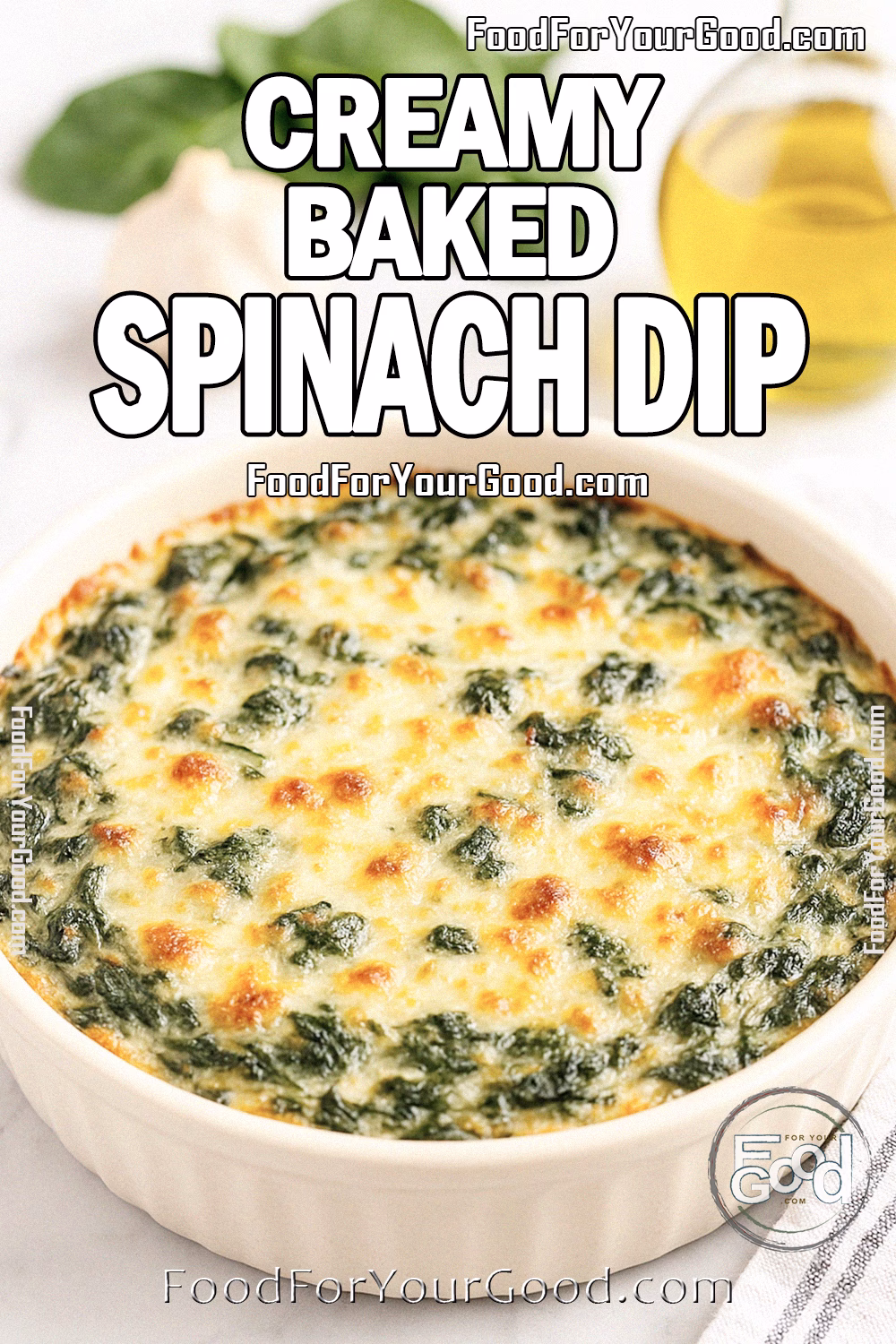 Creamy Baked Spinach Dip Recipe - FoodForYourGood.com Homemade Creamy Baked Spinach Dip with a golden cheesy crust served in a white dish on marble, styled with fresh spinach, garlic, onion, and Parmesan in the background.