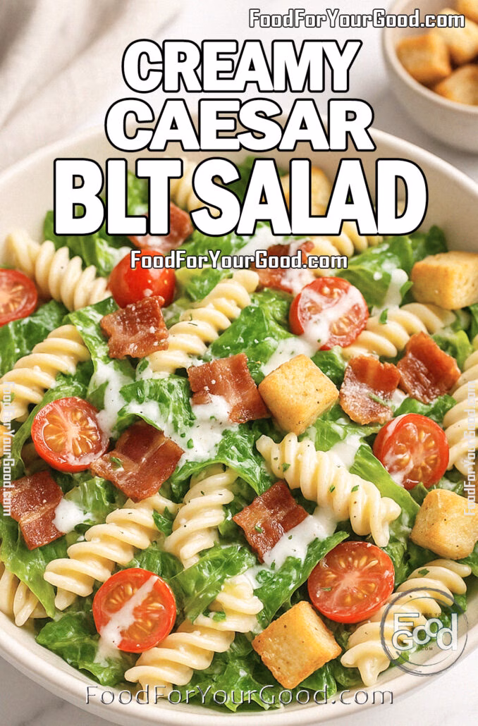 Creamy Caesar BLT Salad Creamy Caesar BLT Salad in a white bowl with pasta, bacon, lettuce, and cherry tomatoes on a marble background.