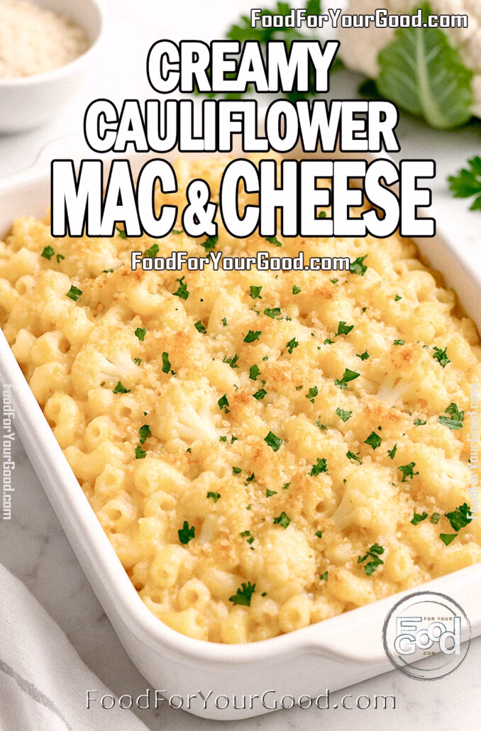Creamy Cauliflower Mac and Cheese baked with golden breadcrumb topping in white dish on marble