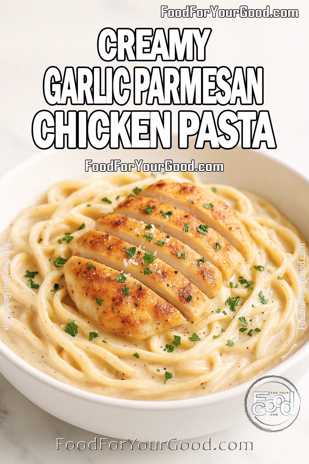 Creamy Garlic Parmesan Chicken Pasta Recipe - FoodForYourGood.com Creamy Garlic Parmesan Chicken Pasta in a white bowl with golden chicken slices, creamy sauce, and parsley garnish on marble.
