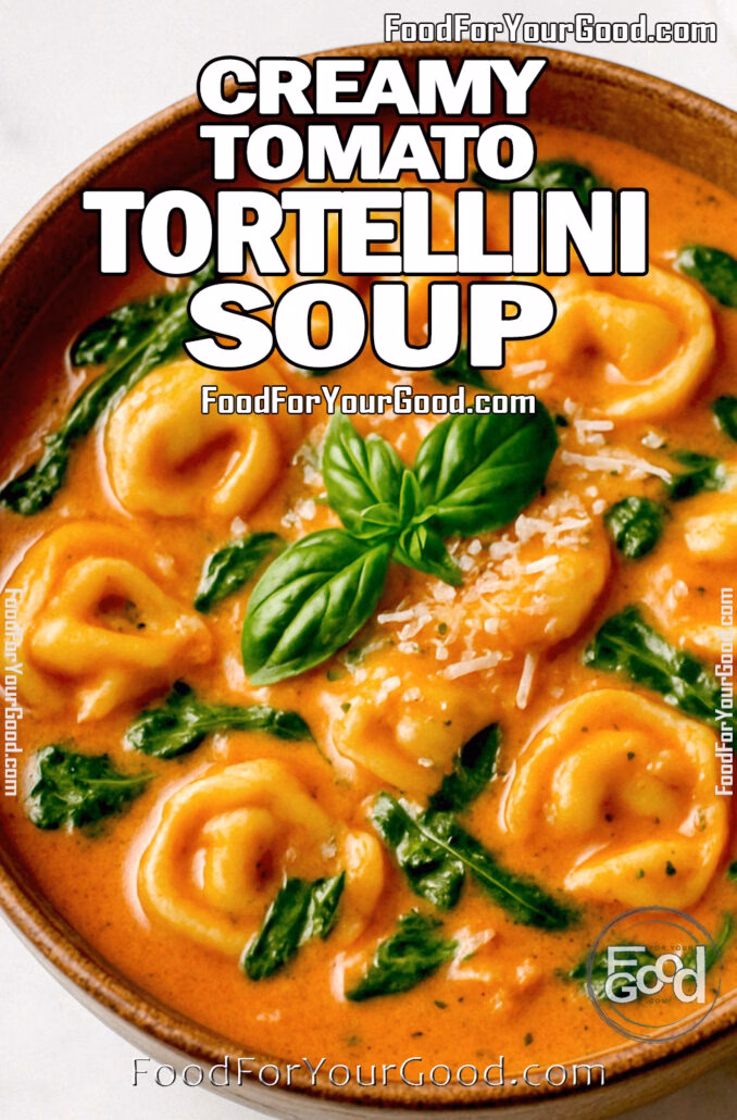 Bowl of creamy tomato tortellini soup with spinach and Parmesan in a rustic ceramic bowl on a marble countertop.