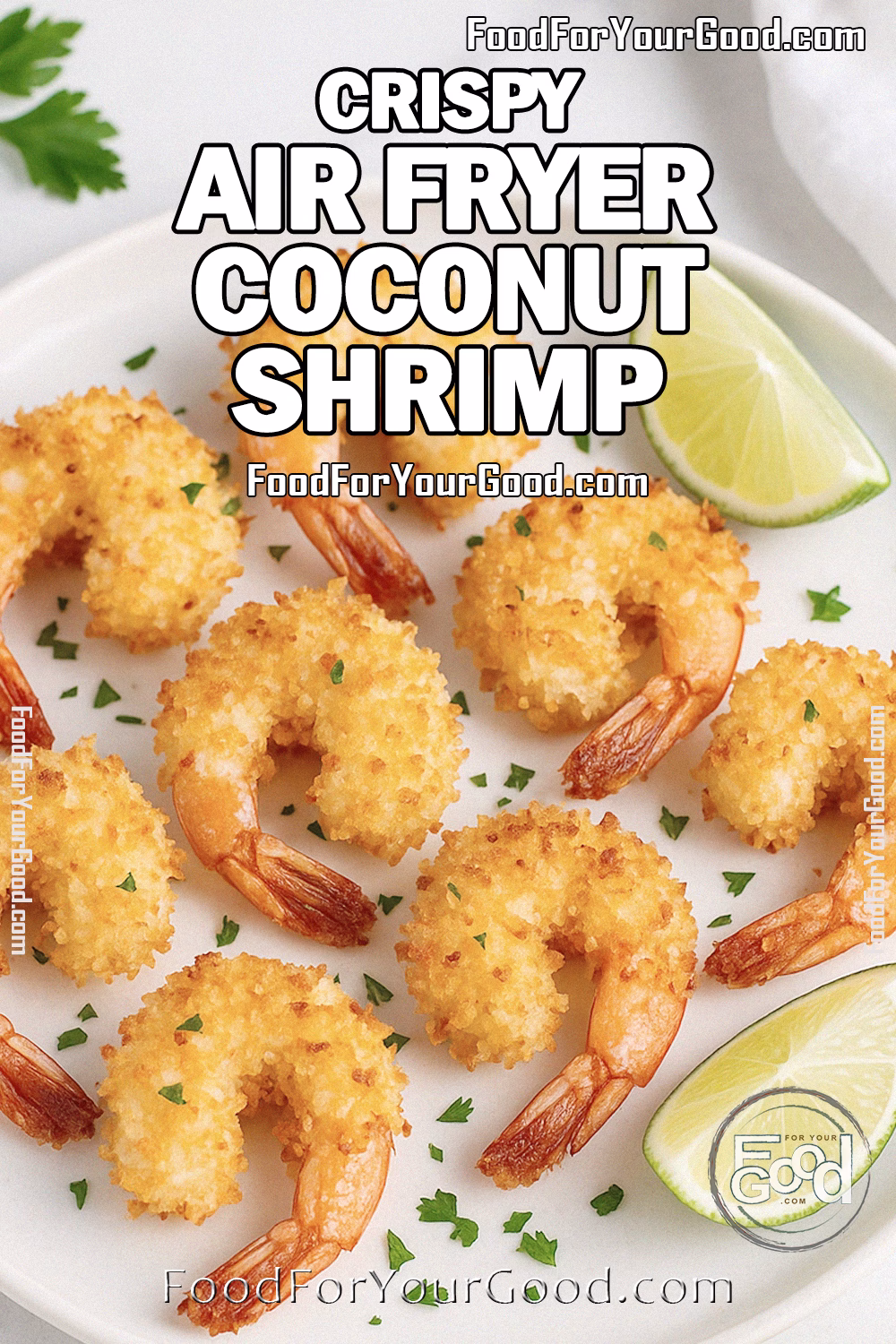 Crispy Air Fryer Coconut Shrimp Recipe | FoodForYourGood.com Crispy Air Fryer Coconut Shrimp on a white plate with lime wedges and parsley garnish, set on marble with a white towel in the background.