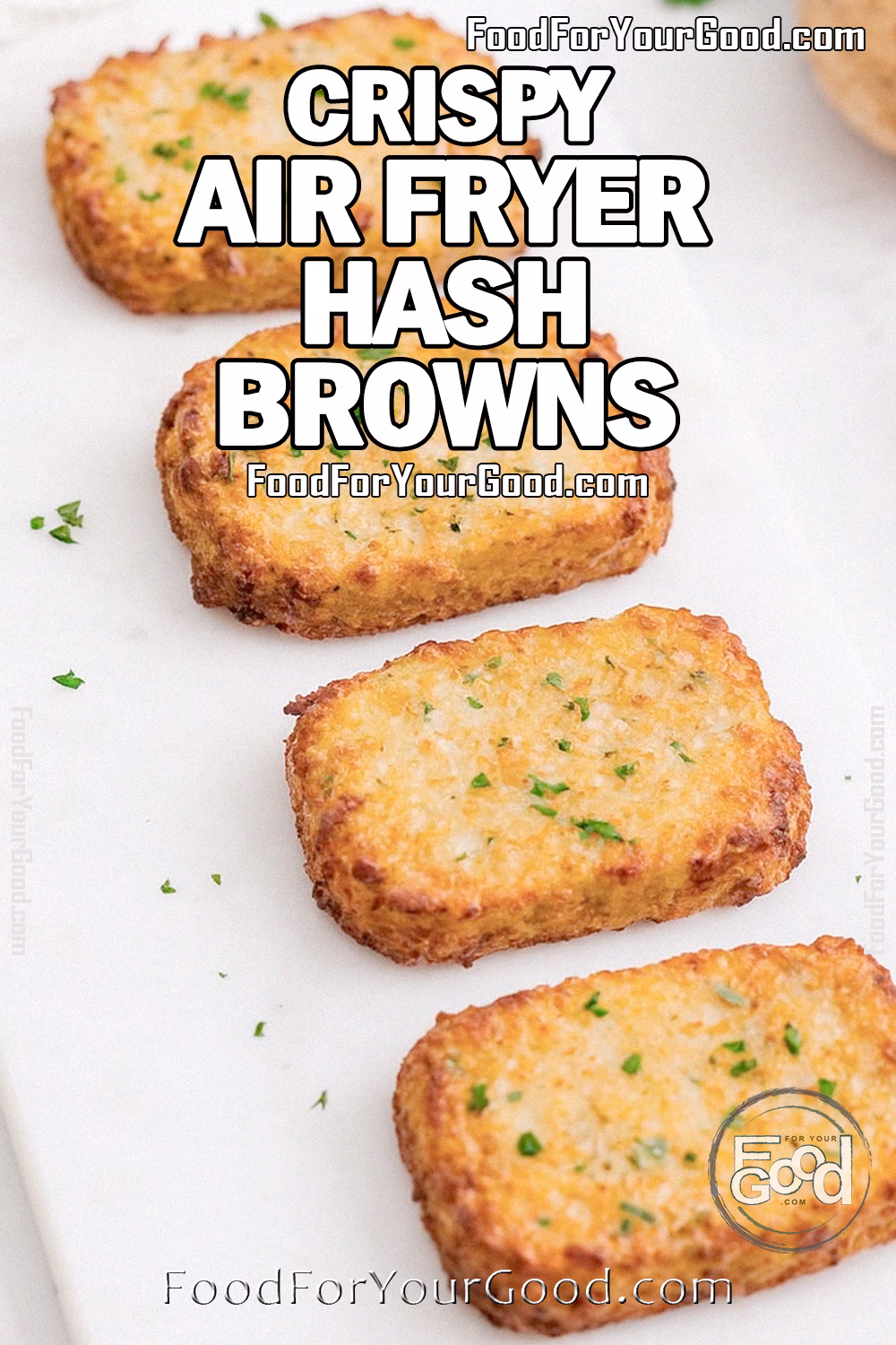 Crispy Air Fryer Hash Browns Recipe - FoodForYourGood.com Crispy Air Fryer Hash Browns arranged on a white marble tray, golden and rustic, topped with fresh parsley. Styled with whole potatoes and a white towel on a marble countertop for an upscale, homemade look.