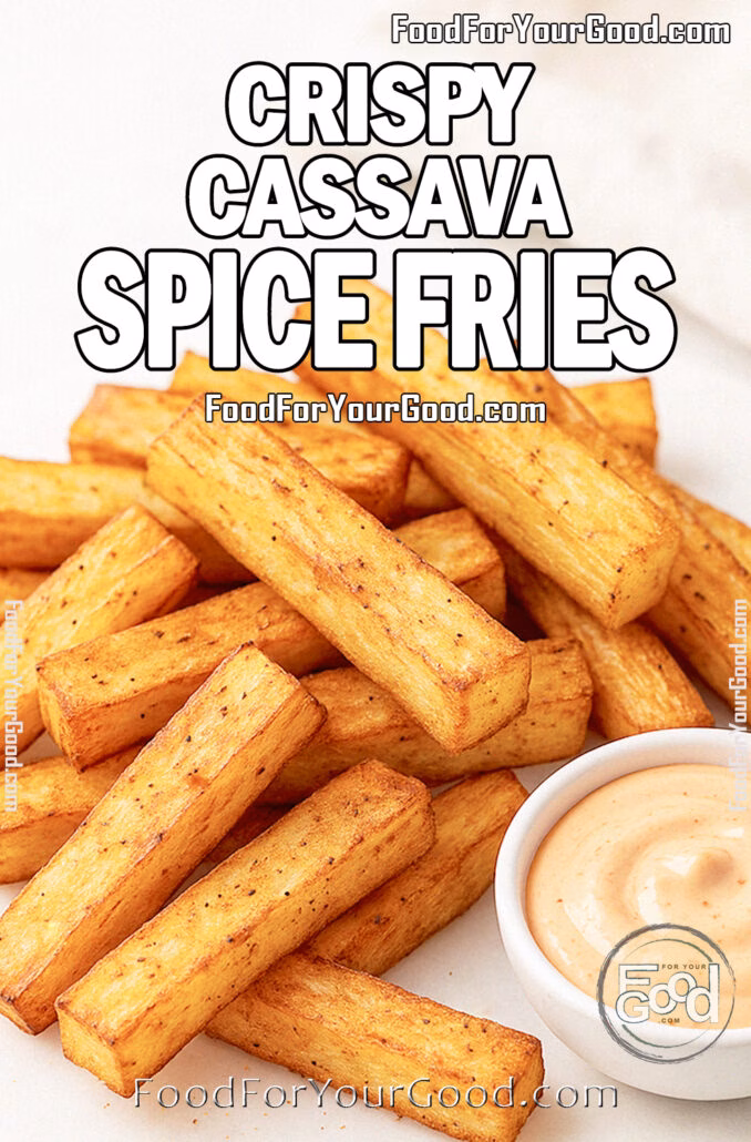Crispy Cassava Spice Fries Crispy Cassava Spice Fries served on a white marble platter with creamy spicy mayo dip and fresh yuca root in the background, captured in natural daylight on FoodForYourGood.com