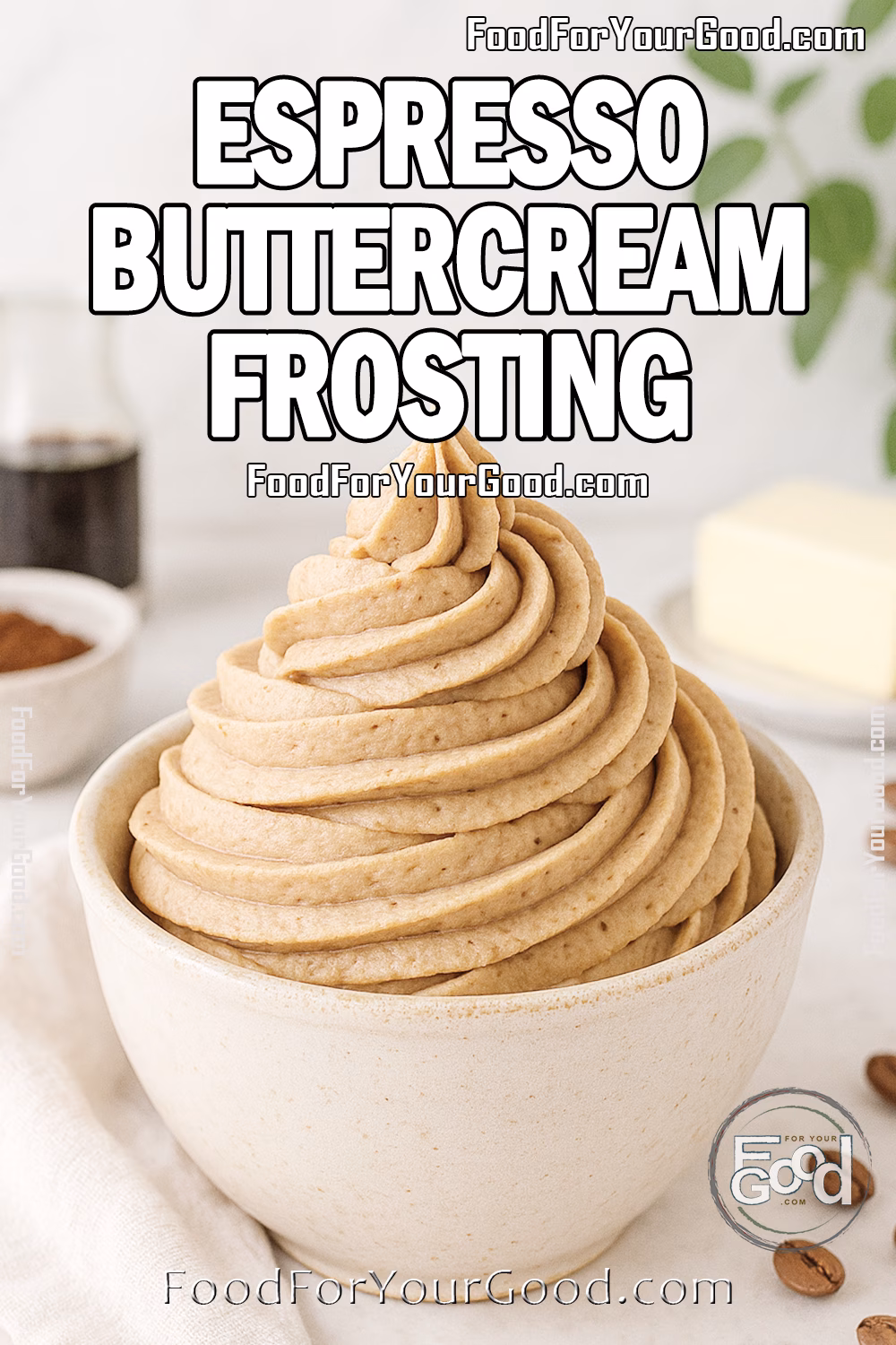 Espresso Buttercream Frosting Recipe – FoodForYourGood.com Homemade Espresso Buttercream Frosting in a rustic ceramic bowl on a white marble countertop, surrounded by espresso powder, butter, and coffee beans.