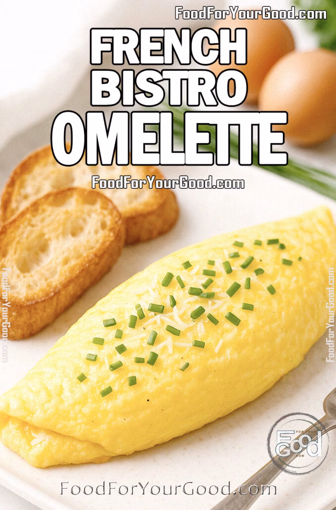 French Bistro Omelette French Bistro Omelette with chives and crispy buttered baguette slices on a white plate.