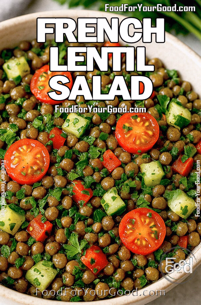 A bowl of French Lentil Salad with cherry tomatoes, cucumbers, red bell peppers, and parsley, served on a white marble surface with a gray towel and fresh parsley in the background.