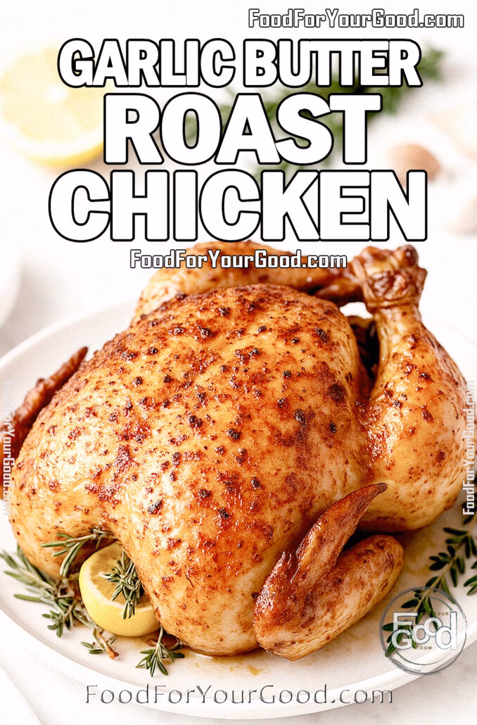 Garlic Butter Roast Chicken Garlic Butter Roast Chicken on a white plate with herbs, lemon, and garlic on a marble countertop.