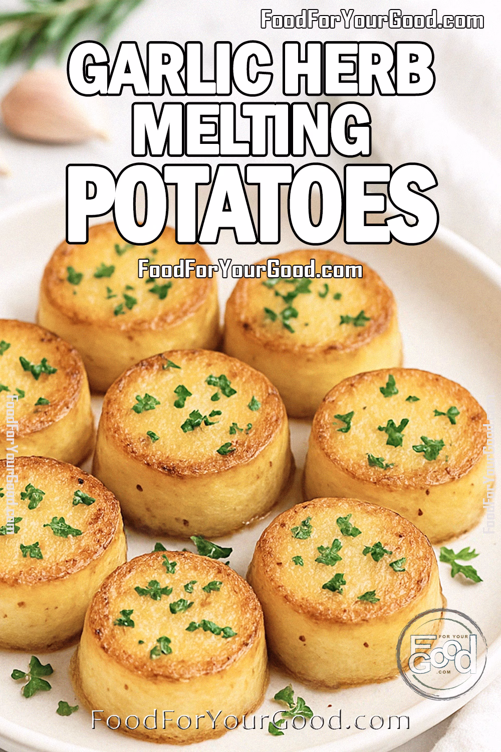 Garlic Herb Melting Potatoes Recipe – FoodForYourGood.com Garlic Herb Melting Potatoes with less butter, served golden brown in a white dish on marble with parsley garnish.