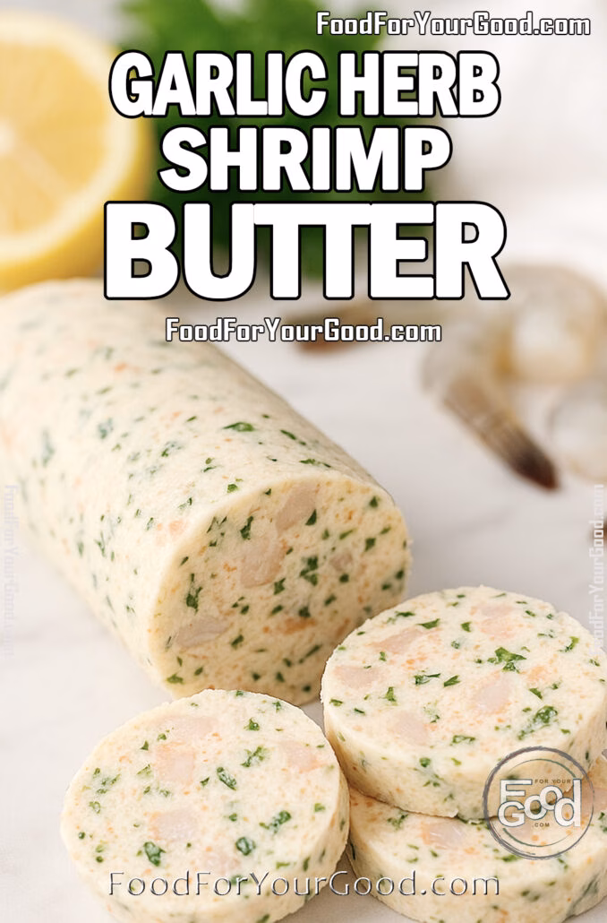 Garlic Herb Shrimp Butter Garlic Herb Shrimp Butter log with slices on white marble, with lemon, parsley, and raw shrimp in the blurred background.