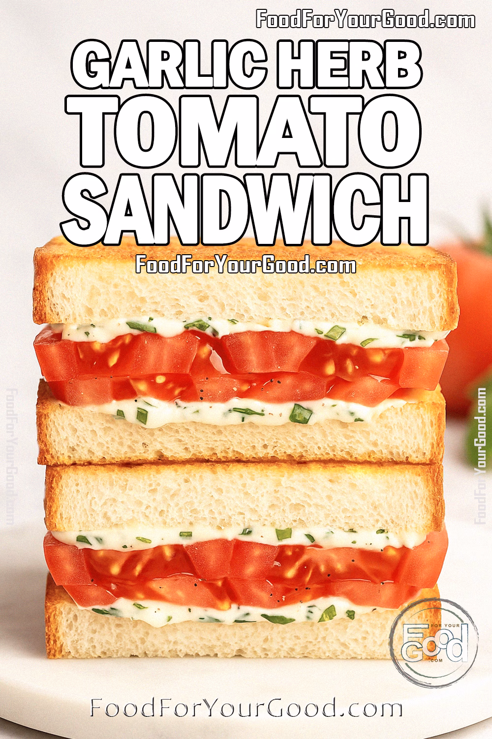 Garlic Herb Tomato Sandwich Recipe on FoodForYourGood.com Garlic Herb Tomato Sandwich stacked on marble with fresh tomato and basil in background