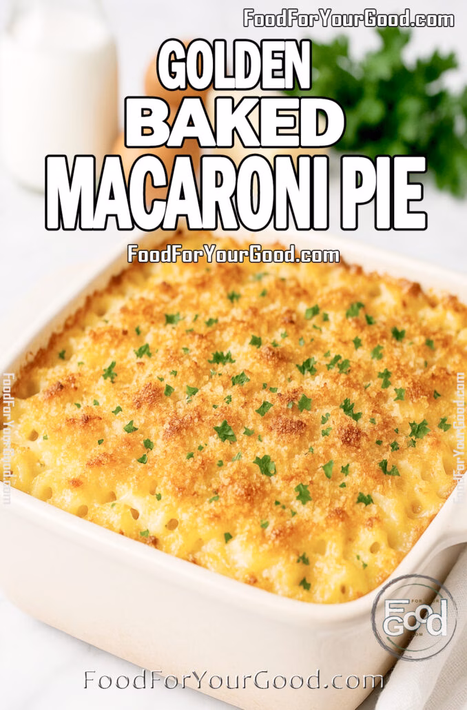 Golden Baked Macaroni Pie in a white baking dish topped with crispy breadcrumbs and parsley on a marble countertop.