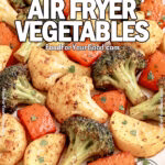 Golden Crisp Air Fryer Vegetables on a marble background with fresh parsley garnish, red bell pepper, and broccoli in the blurred background.