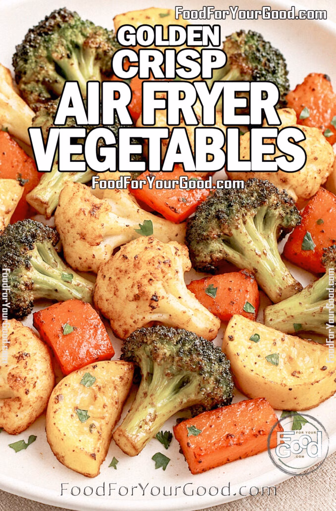 Golden Crisp Air Fryer Vegetables Golden Crisp Air Fryer Vegetables on a marble background with fresh parsley garnish, red bell pepper, and broccoli in the blurred background.