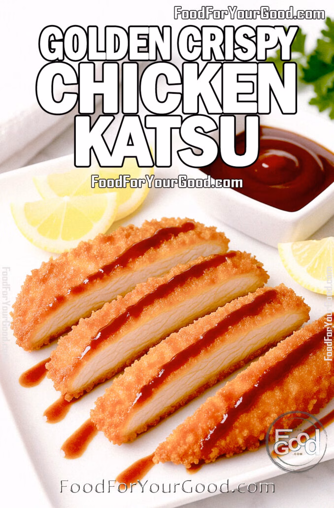 Golden Crispy Chicken Katsu Golden Crispy Chicken Katsu served on a heavy, luxurious square white plate with a matching square sauce dish, drizzled diagonally in a gourmet style with tonkatsu sauce, accompanied by lemon wedges, on a white marble background with fresh herbs and a white towel in the background for FoodForYourGood.com