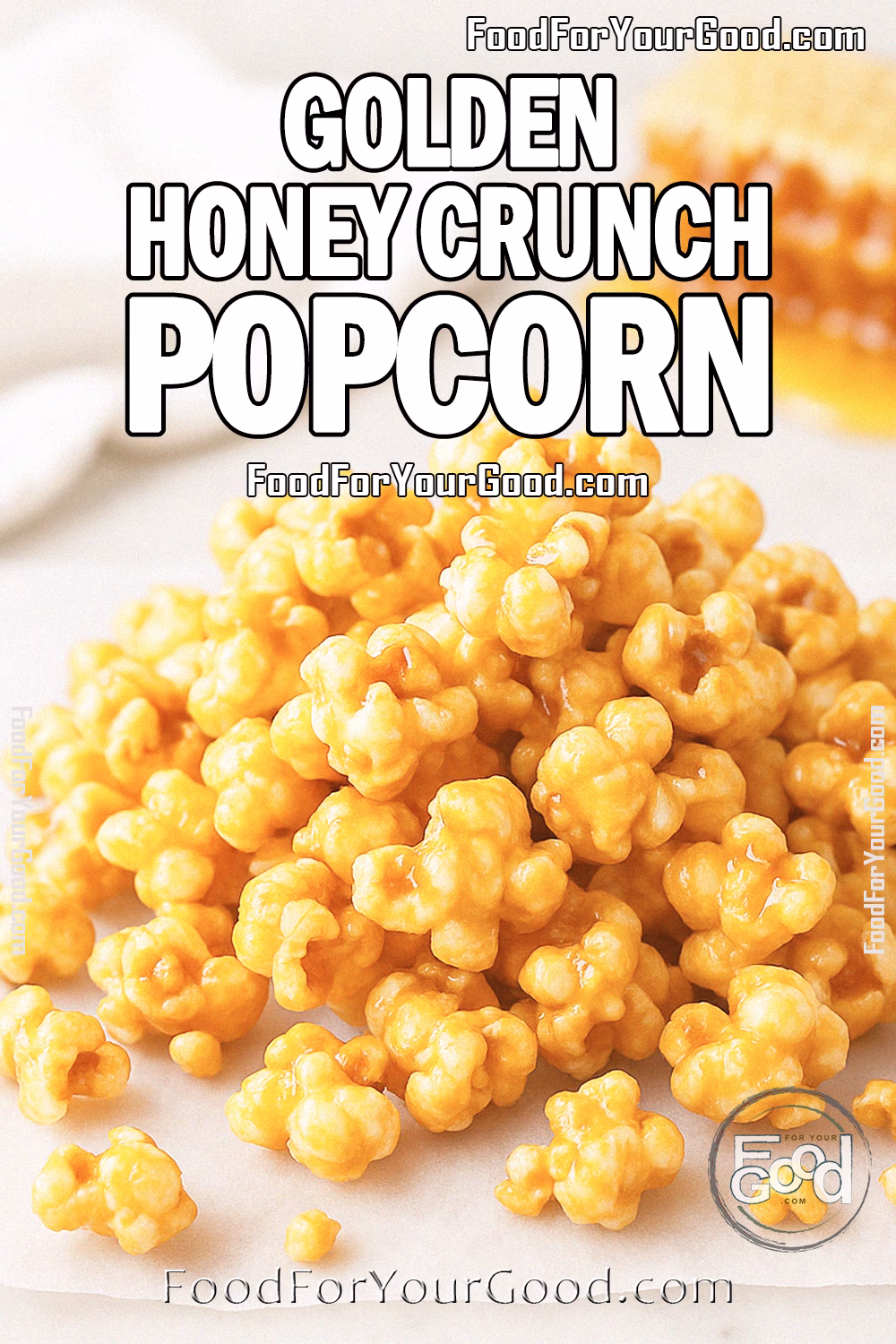 Golden Honey Crunch Popcorn Recipe – FoodForYourGood.com Golden Honey Crunch Popcorn on a marble surface, scattered for a homemade look, with honeycomb dripping honey and an ear of corn in the blurred background.