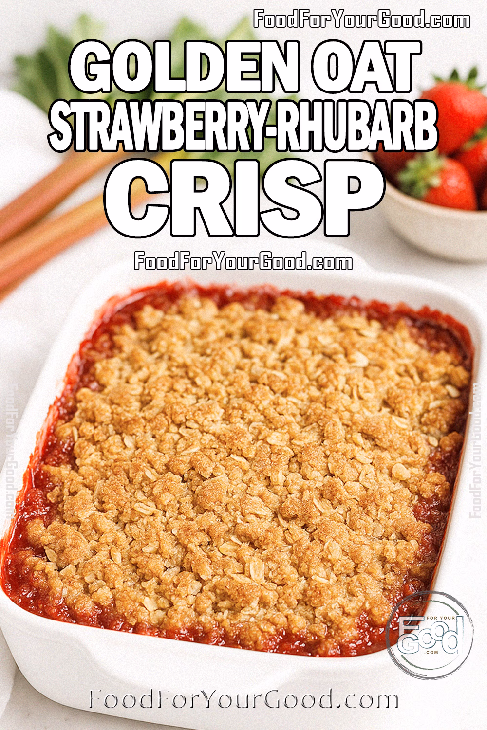 Golden Oat Strawberry-Rhubarb Crisp in a white dish with golden oat topping, fresh strawberries, and rhubarb on marble countertop.