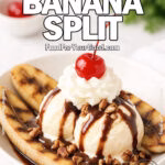 Grilled Banana Split served in a white bowl with vanilla ice cream, drizzled with chocolate and caramel, topped with whipped cream, cherry, and toasted pecans on FoodForYourGood.com