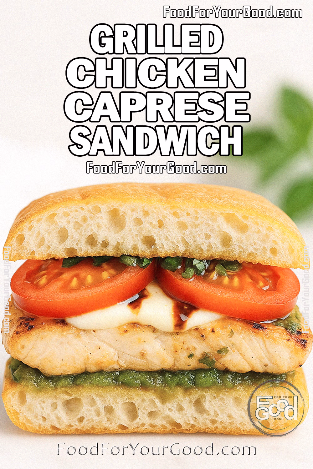 Two halves of a Grilled Chicken Caprese Sandwich on ciabatta with grilled chicken, mozzarella, tomato slices, chopped basil, and balsamic glaze on a white marble surface.